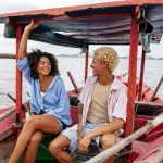 couple on vacation on a small boat