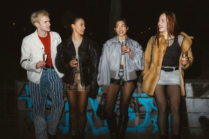 young adults showing off high and low fashion blends