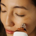 woman using at home micro needling